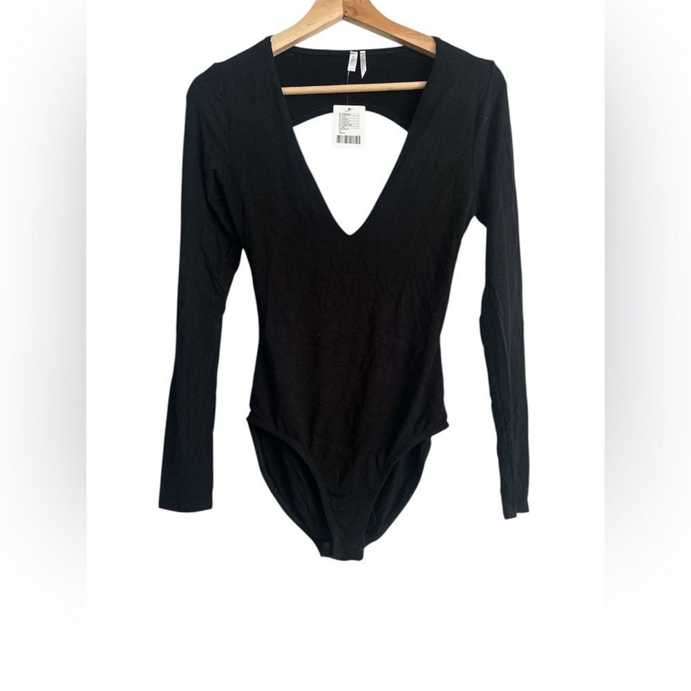 Urban Outfitters v-neck long sleeve Black Body Suit with back cut out NWT